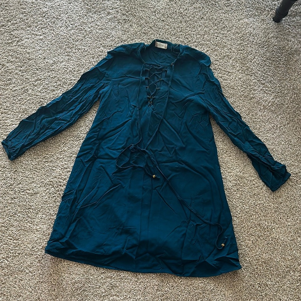 Mini dress or can be worn as long shirt